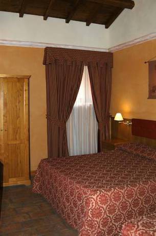 Imagen de la habitación del Hotel Casale Della Certosa. Foto 13