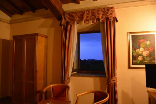 Imagen de la habitación del Hotel Casale Della Certosa. Foto 16