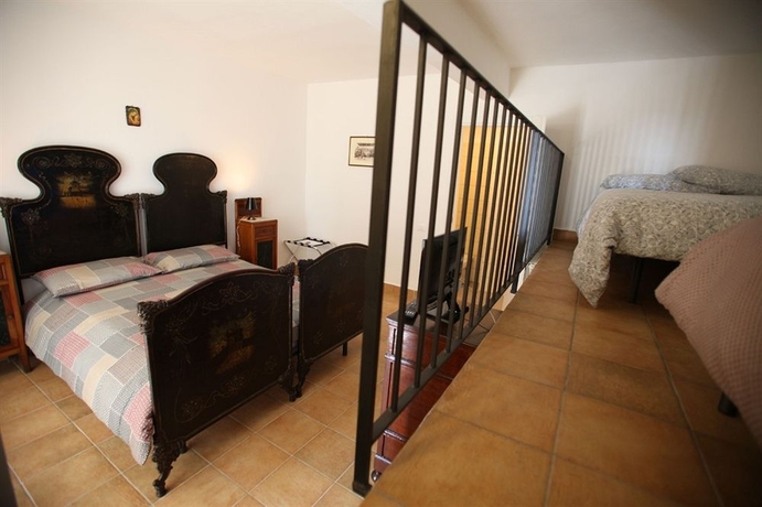 Imagen de la habitación del Hotel Casale Poggio Del Tiglio. Foto 4