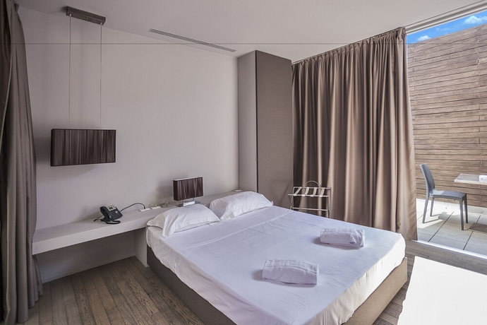 Imagen de la habitación del Hotel Casalunga Golf Resort. Foto 11