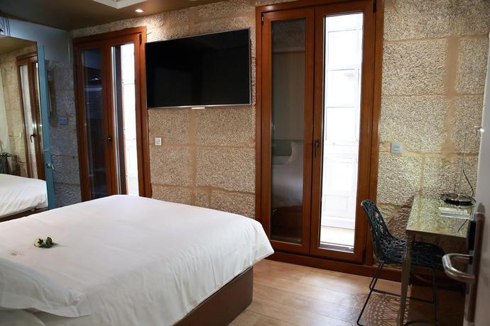 Imagen de la habitación del Hotel Casas Reais Boutique. Foto 4