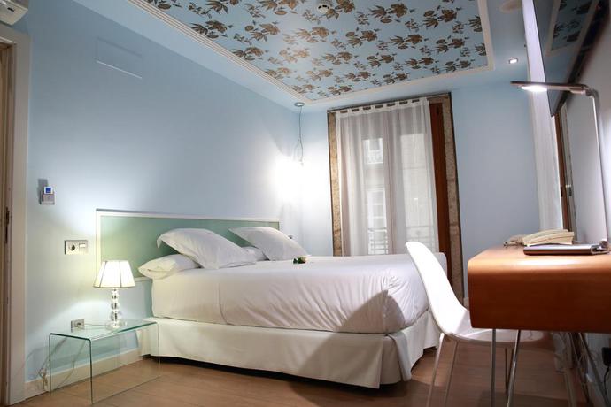 Imagen de la habitación del Hotel Casas Reais Boutique. Foto 13