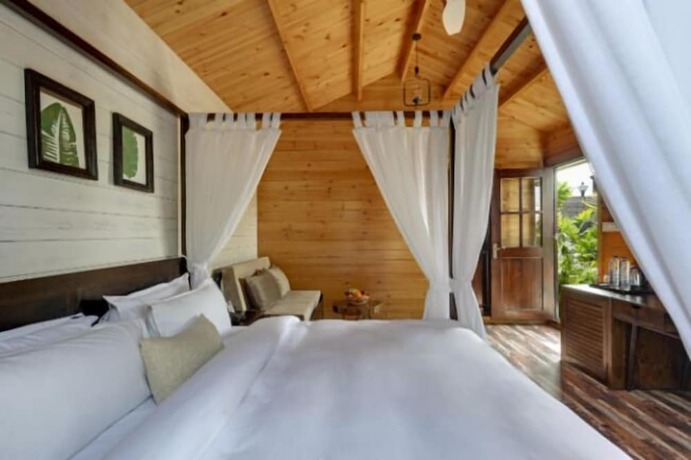 Imagen de la habitación del Hotel Casawood Resort. Foto 13