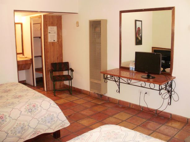 Imagen de la habitación del Hotel Cascada Inn. Foto 6