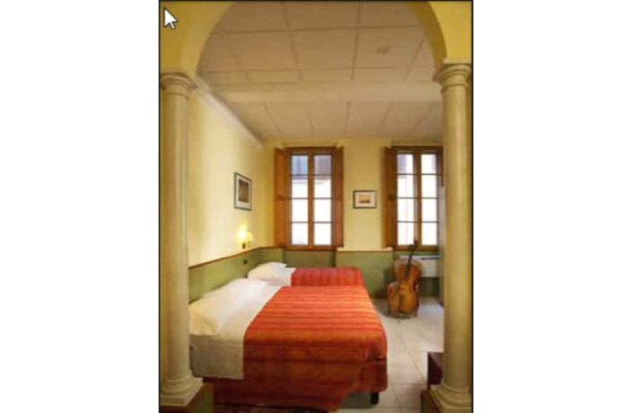 Imagen de la habitación del Hotel Casci. Foto 6
