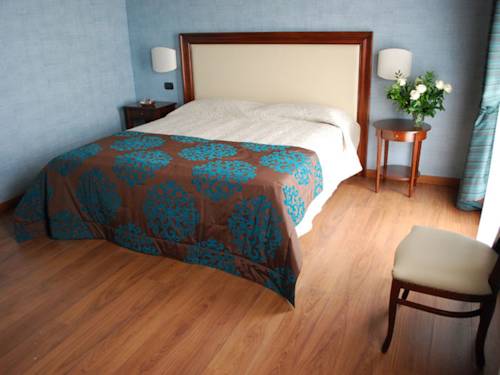 Imagen de la habitación del Hotel Cascina Marisa. Foto 12