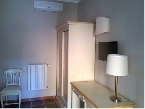 Imagen de la habitación del Hotel Cascina Marisa. Foto 16