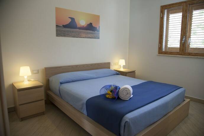 Imagen de la habitación del Hotel Case Vacanze Baia, Lido Rossello. Foto 18