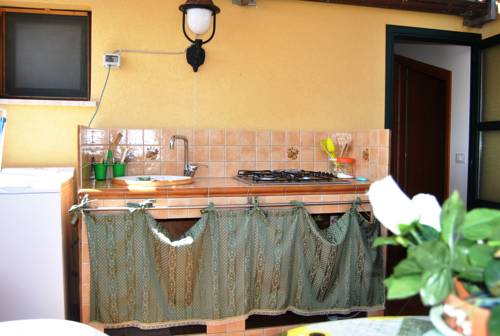 Imagen de la habitación del Hotel Case Vacanze Paradise Beach. Foto 1