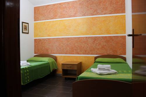 Imagen de la habitación del Hotel Case Vacanze Paradise Beach. Foto 4