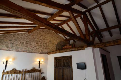 Imagen de la habitación del Hotel Caserón De La Fuente. Foto 7