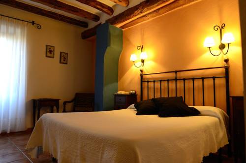 Imagen de la habitación del Hotel Caserón De La Fuente. Foto 12