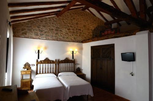 Imagen de la habitación del Hotel Caserón De La Fuente. Foto 15