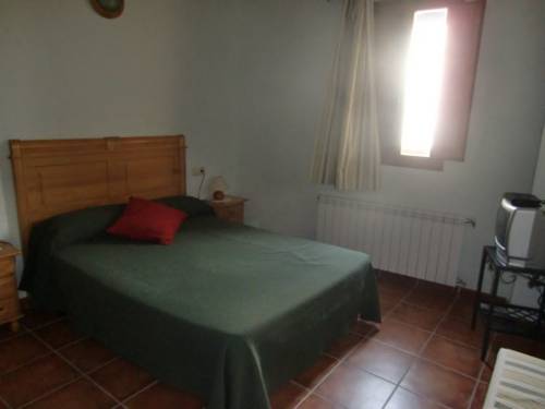 Imagen de la habitación del Hotel Cases Dels Gasulla. Foto 13