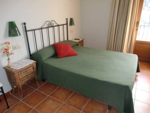 Imagen de la habitación del Hotel Cases Dels Gasulla. Foto 16