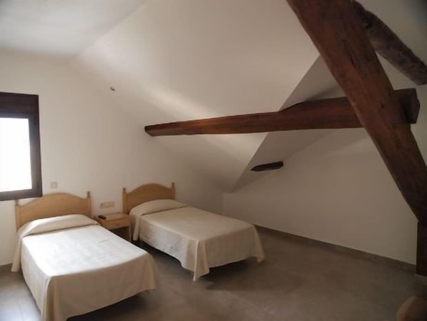 Imagen de la habitación del Hotel Cases. Foto 8