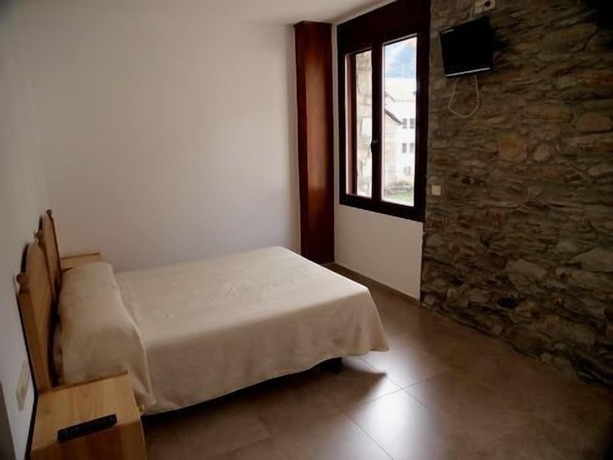 Imagen de la habitación del Hotel Cases. Foto 9