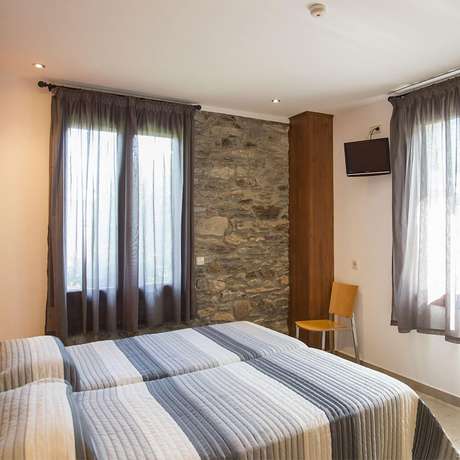 Imagen de la habitación del Hotel Cases. Foto 11