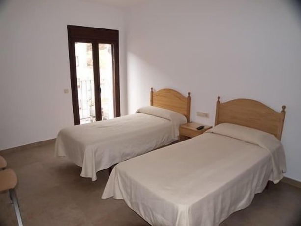 Imagen de la habitación del Hotel Cases. Foto 14