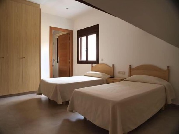 Imagen de la habitación del Hotel Cases. Foto 15
