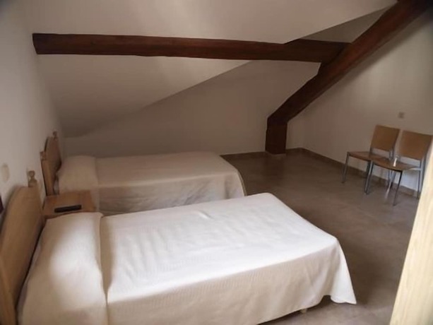 Imagen de la habitación del Hotel Cases. Foto 16