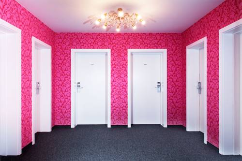 Imagen de la habitación del Hotel Casinohotel Velden. Foto 4