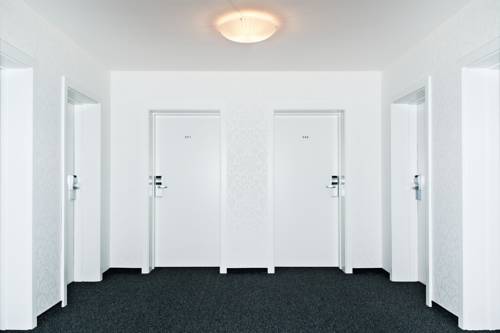 Imagen de la habitación del Hotel Casinohotel Velden. Foto 5