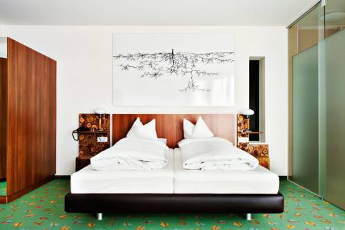 Imagen de la habitación del Hotel Casinohotel Velden. Foto 6