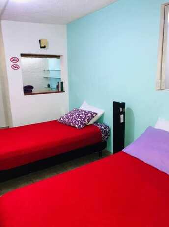 Imagen de la habitación del Hotel Casita del Arbol. Foto 11
