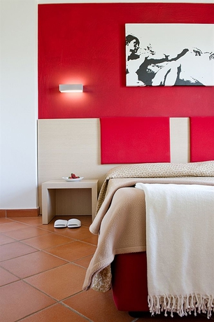 Imagen de la habitación del Hotel Casolare Le Terre Rosse. Foto 3