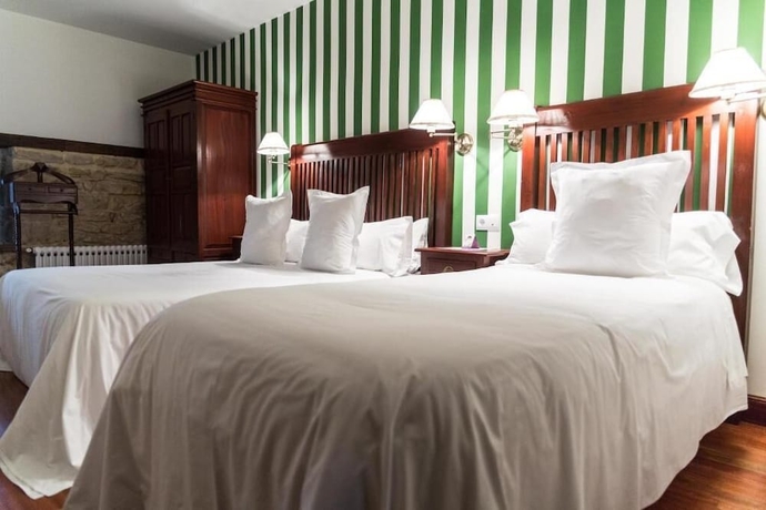 Imagen de la habitación del Hotel Casona Del Nansa. Foto 11