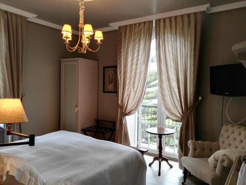 Imagen de la habitación del Hotel Casona Naviega. Foto 16