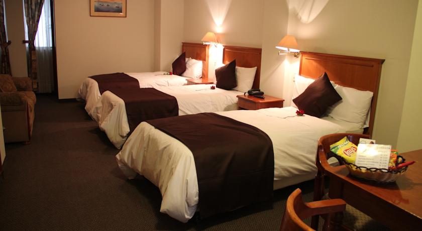 Imagen de la habitación del Hotel Casona Plaza Puno. Foto 6