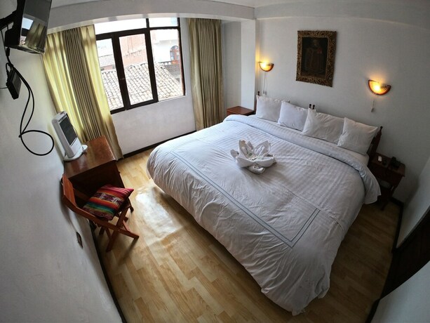 Imagen de la habitación del Hotel Casona Quera. Foto 16