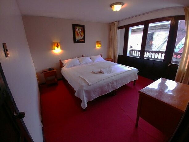 Imagen de la habitación del Hotel Casona Quera. Foto 26