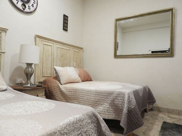Imagen de la habitación del Hotel Casona San Cayetano Suites and Lofts. Foto 13