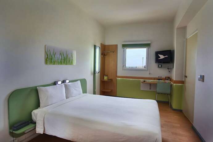 Imagen de la habitación del Hotel Caspia Pro Greater Noida. Foto 24