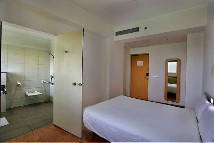 Imagen de la habitación del Hotel Caspia Pro Greater Noida. Foto 27