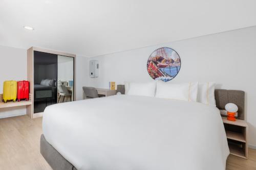 Imagen de la habitación del Hotel Cassia Rama 9 Bangkok by Banyan Group. Foto 4