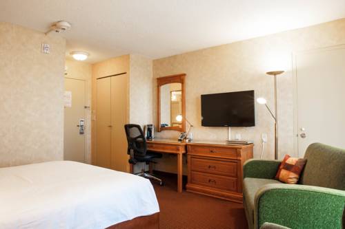 Imagen de la habitación del Hotel Castel, Granby. Foto 8