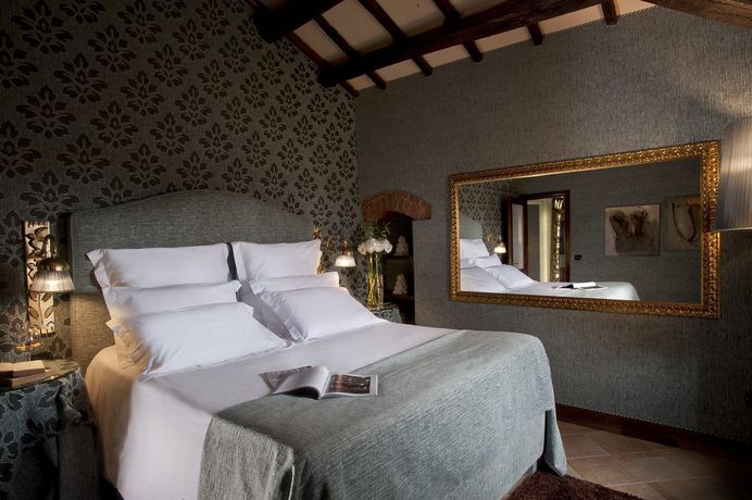 Imagen de la habitación del Hotel Castel Porrona Relais and Spa. Foto 5