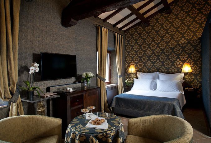 Imagen de la habitación del Hotel Castel Porrona Relais and Spa. Foto 6