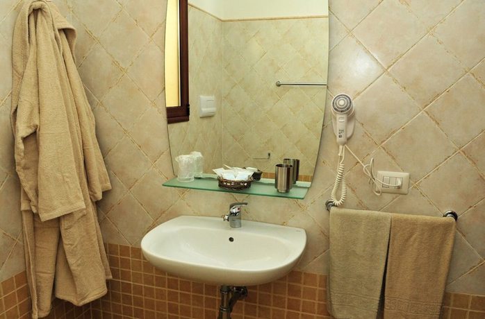 Imagen de la habitación del Hotel Castello Budoni. Foto 11