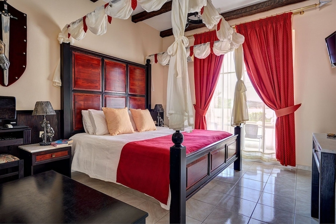 Imagen de la habitación del Hotel Castello Di Cavallieri Suites. Foto 2