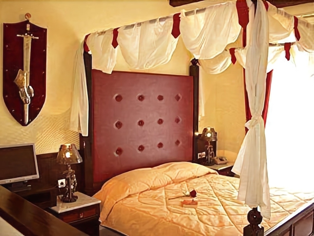 Imagen de la habitación del Hotel Castello Di Cavallieri Suites. Foto 3