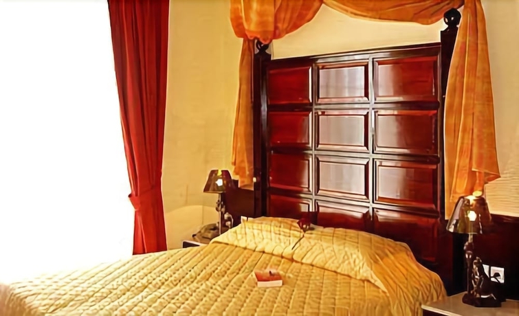 Imagen de la habitación del Hotel Castello Di Cavallieri Suites. Foto 10