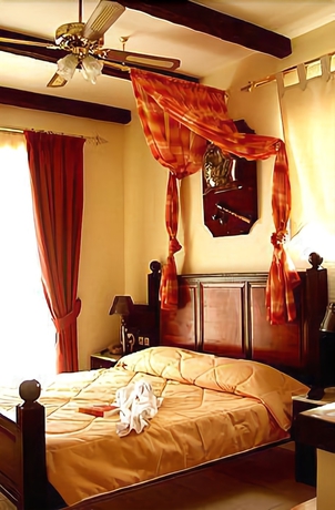 Imagen de la habitación del Hotel Castello Di Cavallieri Suites. Foto 11