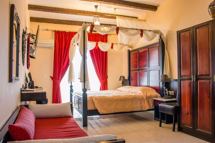 Imagen de la habitación del Hotel Castello Di Cavallieri Suites. Foto 17