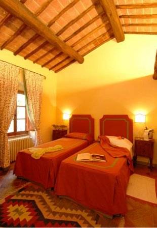 Imagen de la habitación del Hotel Castello Di Gargonza. Foto 11