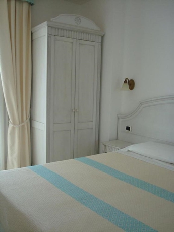 Imagen de la habitación del Hotel Castello Di Tavolara. Foto 15